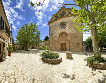 Entrance of historic building against sky