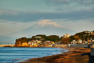 Scenic view of sea against cloudy sky