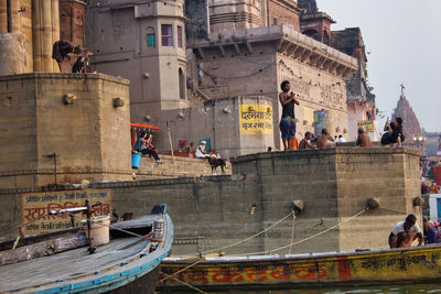 Group of people in front of buildings