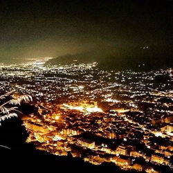 Aerial view of illuminated cityscape