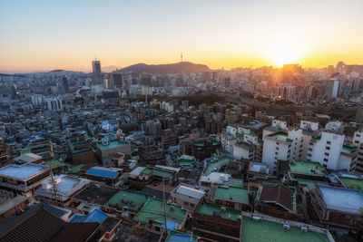 Sunset view over seoul city with view of n seoul tower. taken from changsindong, seoul, south korea.