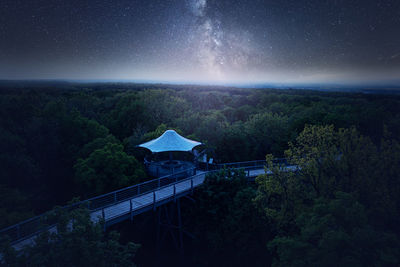 Scenic view of mountains against sky at night