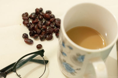 High angle view of coffee cup on table