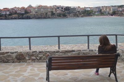 People sitting in river