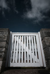 Low angle view of the gate against sky
