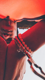 Close-up of person holding rope