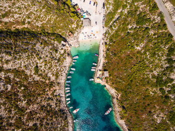 Aerial view of sea and landscape against sky