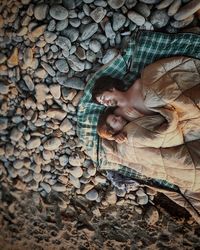 Couple sleeping outdoors