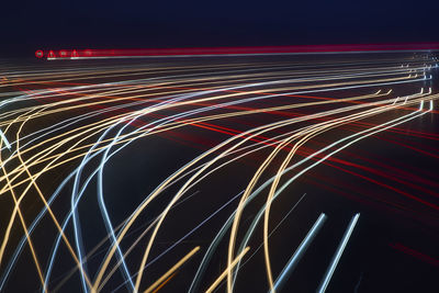 Light trails on road at night