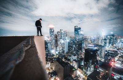 Rear view of woman walking on street