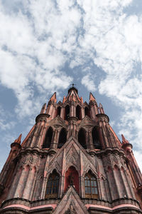 Low angle view of la parroquia de san miguel arcangel church against sky