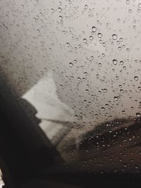 Close-up of water drops on glass