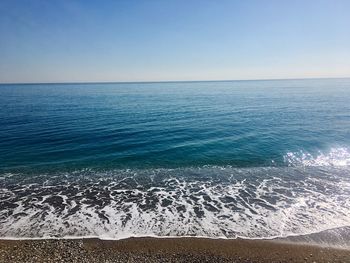 Scenic view of sea against clear sky