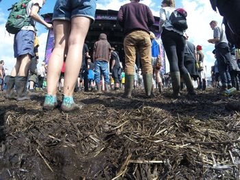 Low section of people standing in park