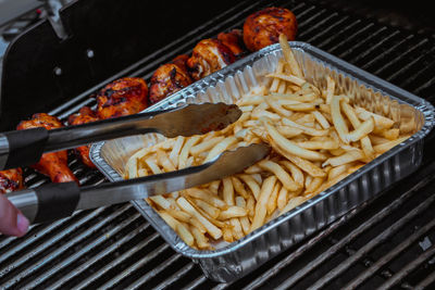 High angle view of food on barbecue grill