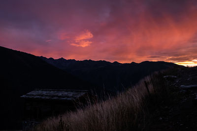 Scenic view of mountains against sky during sunset