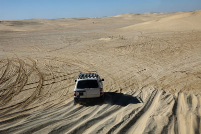 High angle view of car at sahara desert