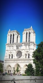 Low angle view of building against blue sky