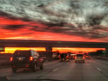 Road passing through dramatic sky