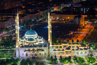 High angle view of illuminated buildings at night