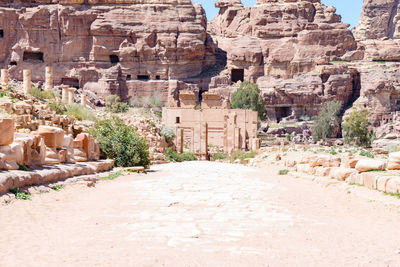 View of old ruin building on rock