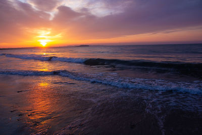 Scenic view of sea against sky during sunset