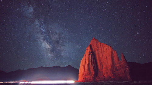 Scenic view of sea against sky at night