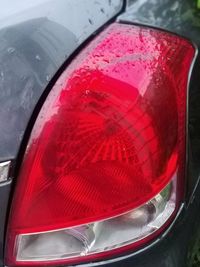 Close-up of wet red car