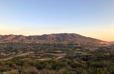Scenic view of landscape against clear sky