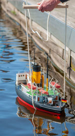 Remote controlled ship model is remote controlled on a lake