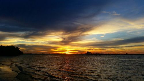 Scenic view of sea at sunset