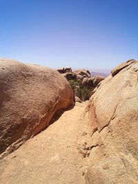 Scenic view of landscape against clear blue sky