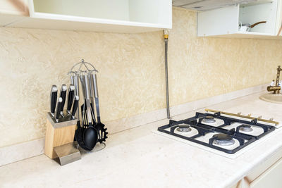 White kitchen set the house with a large dining room.