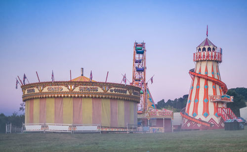 Ferris wheel against sky at amusement park