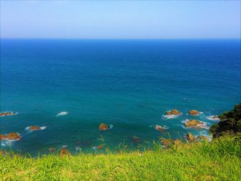 Scenic view of sea against clear sky