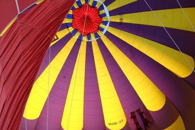 Low angle view of multi colored hot air balloon