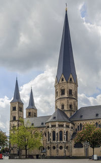 View of buildings against cloudy sky