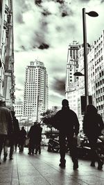 People walking on city street