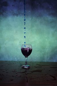 Close-up of wine glass on table