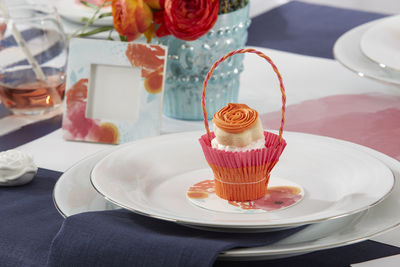 Close-up of cupcake served on table