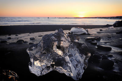 Scenic view of sea against sky during sunset jokulsarlon glacier lagoon, iceland