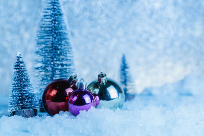 Close-up of christmas decoration on snow