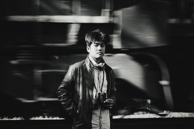 Portrait of young man looking away