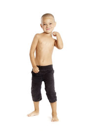 Portrait of happy boy against white background