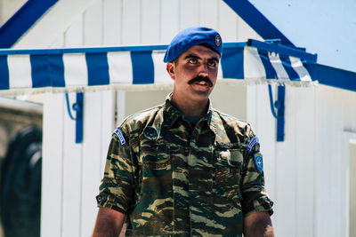 Portrait of young man standing outdoors