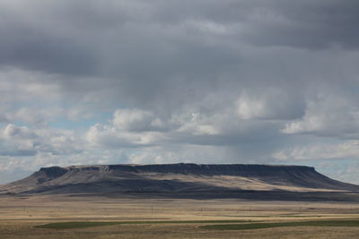 Storm clouds over landscape