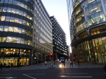 City street and modern buildings at night