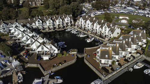 High angle view of river amidst buildings in city