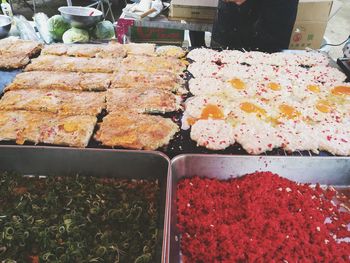 High angle view of multi colored for sale at market stall