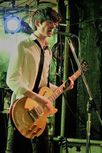 Young man playing guitar